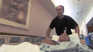 A patient being wheeled on gurney